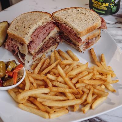 Sky High Triple Decker Sandwiches with fries.