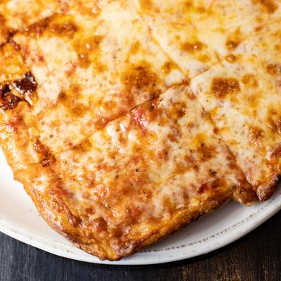 Personal Thick Sicilian pizza, served, closeup