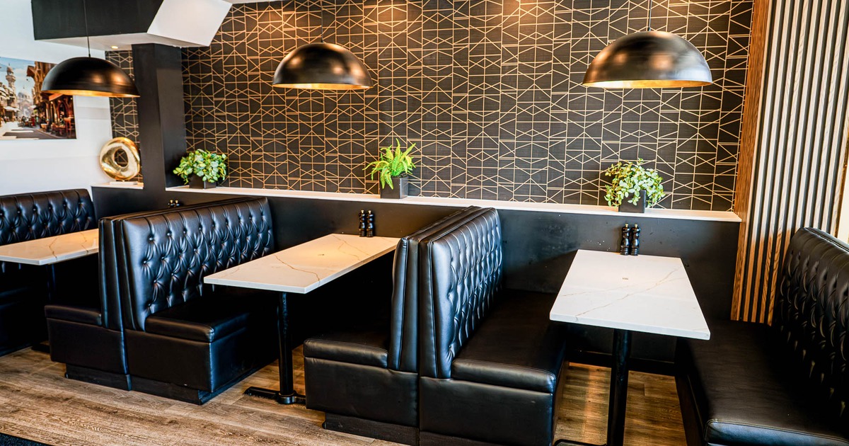 Interior, leather booths all lined up