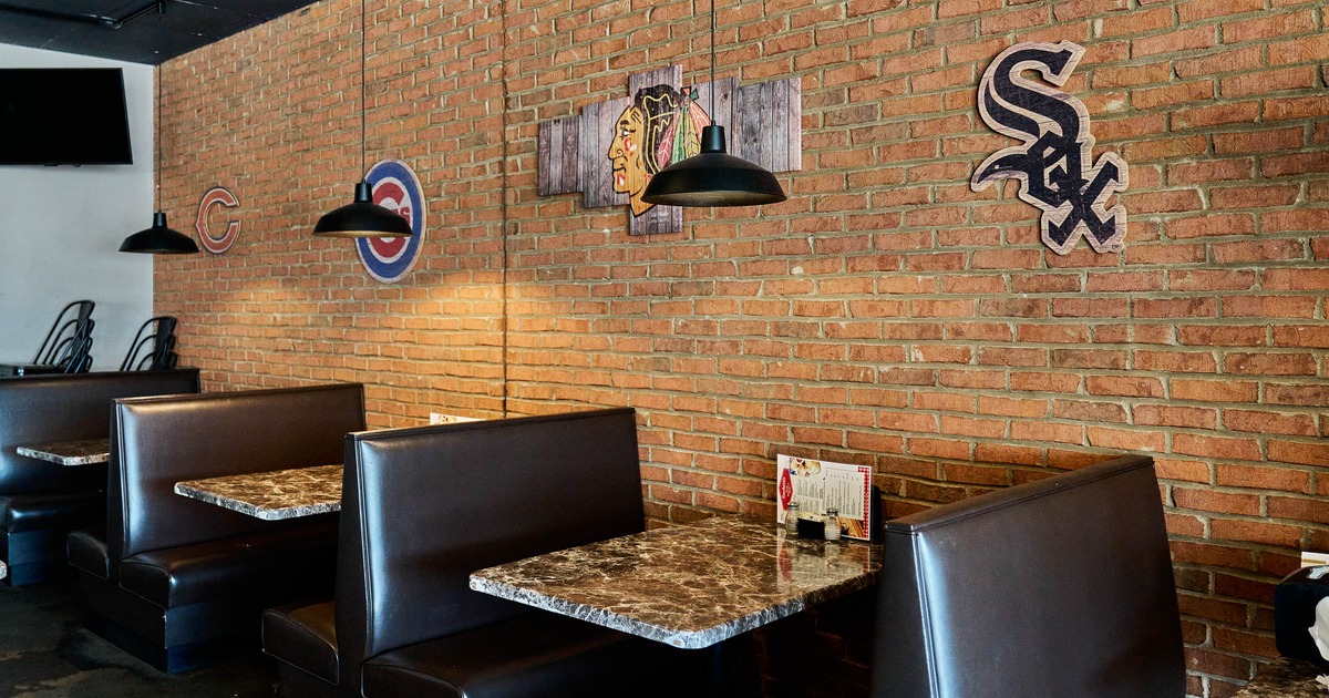 Interior, restaurant booths near wall