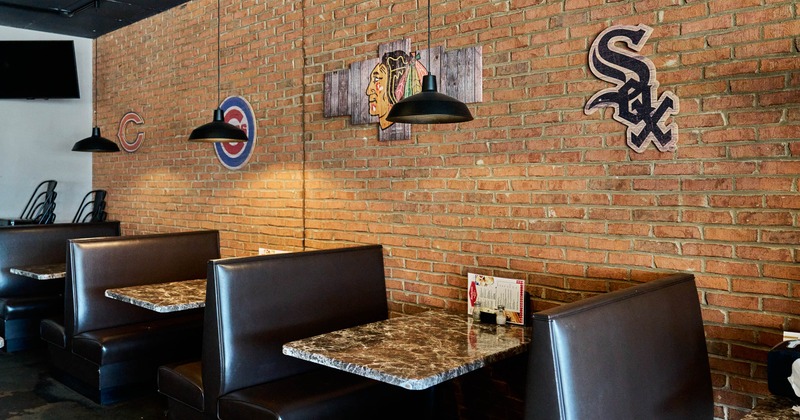 Interior, restaurant booths near wall
