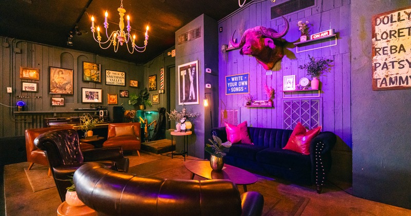 Interior, leather sofas with pictures on the wall