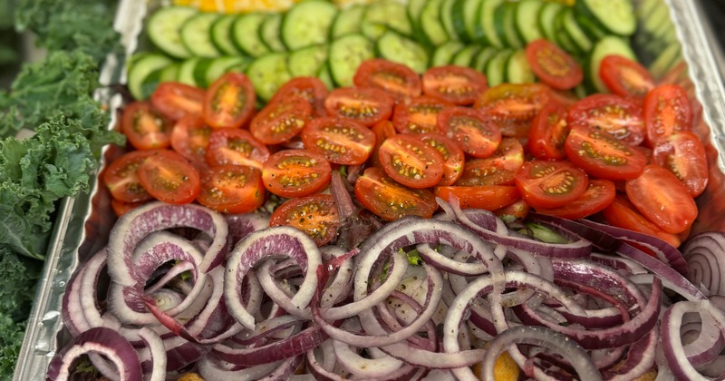 Prepared vegetables in serving containers