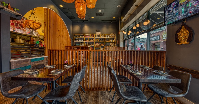 Nicely done interior dining area with set dining tables ready for guests