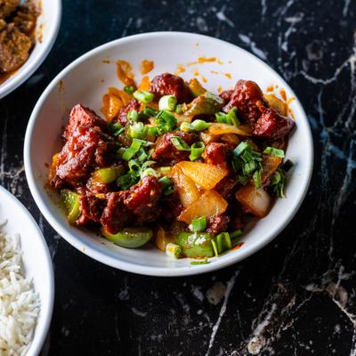 Tender cubes of chicken sauteed with onion, peppers, chilies with our special sauces.