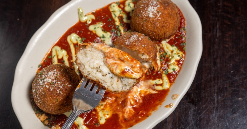 Arancini in tomato sauce with basil aioli