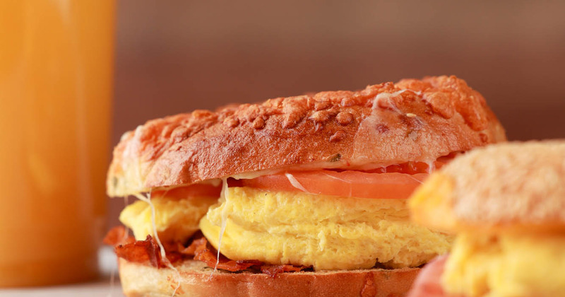 Breakfast sandwiches with orange juice