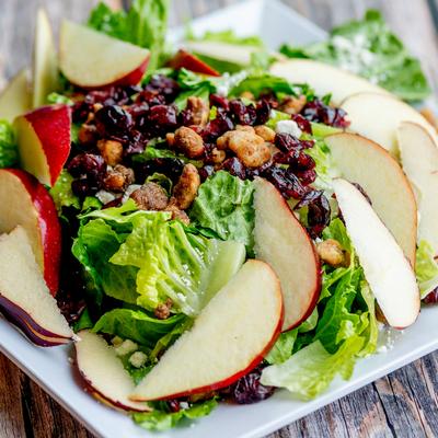 Apple Walnut salad with Raspberry Vinaigrette, close up.