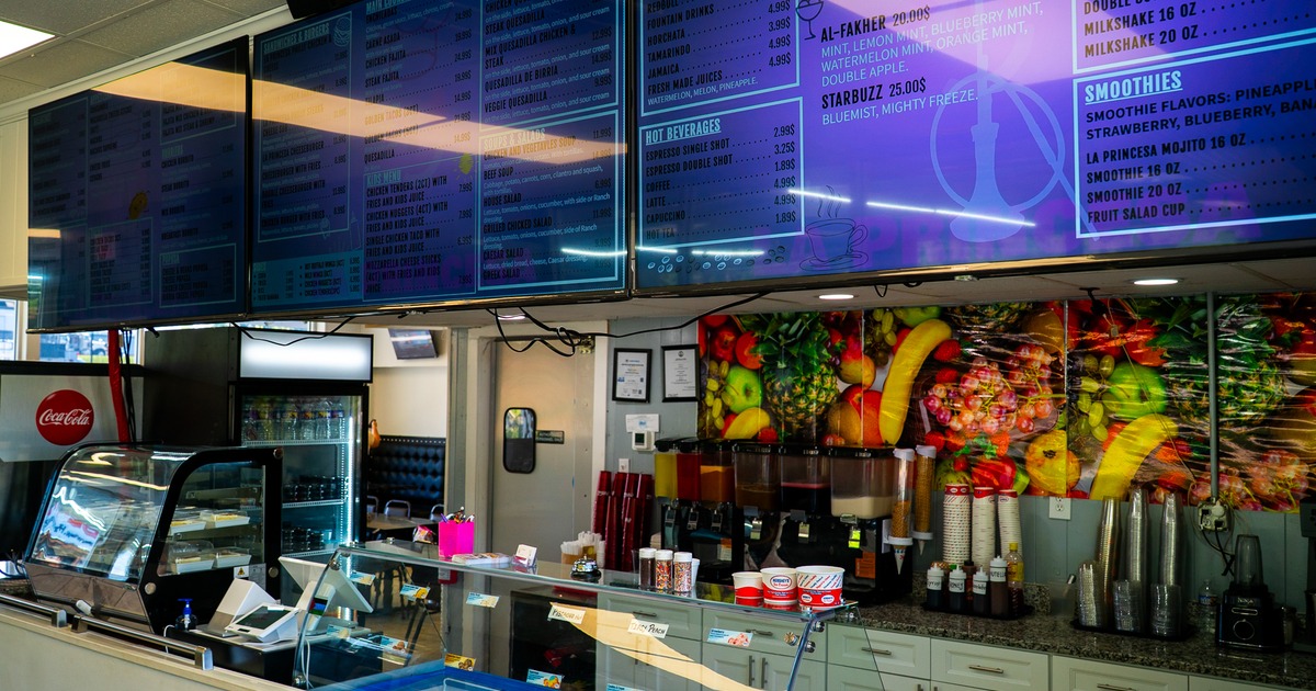 Food counter, screens above