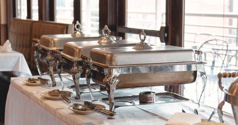 Interior, banquette dining area, tables and chairs ready for guests