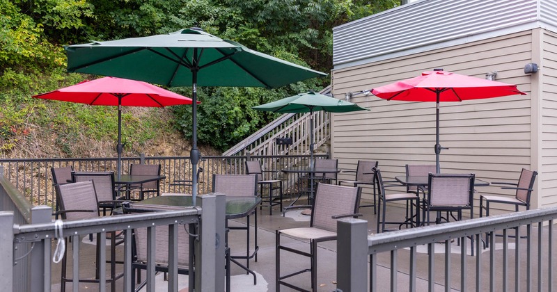 Exterior, tables, chairs and sunshade umbrellas