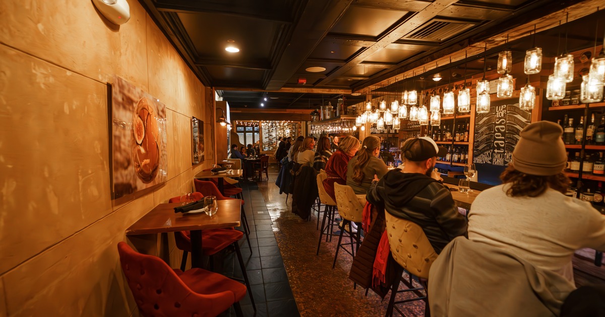 Customers sitting at the bar
