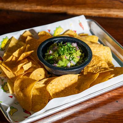 Guacamole and tortilla chips.