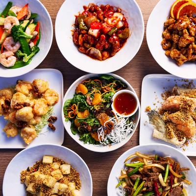 Different food dishes served on the table, top view