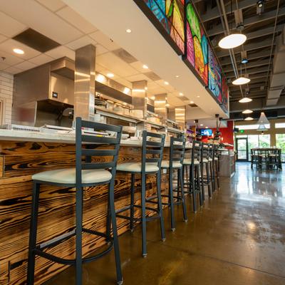 The bar with stools.