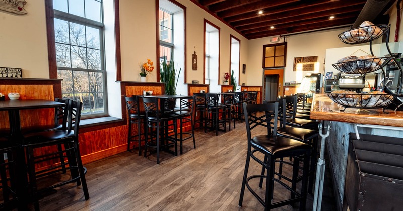 Interior, seating area on the left, bar area on the right