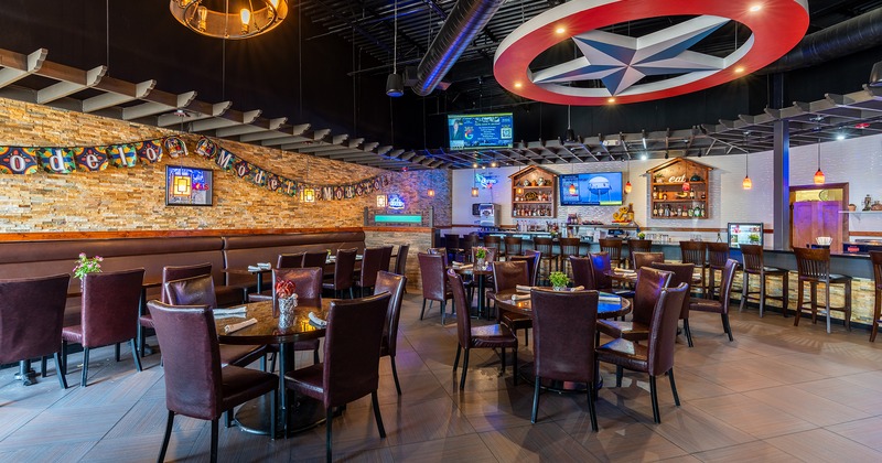 Restaurant interior, dining area with set tables