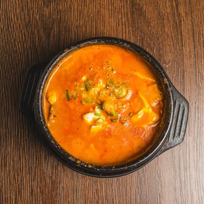 Korean soft tofu stew often served in a hot stone pot.