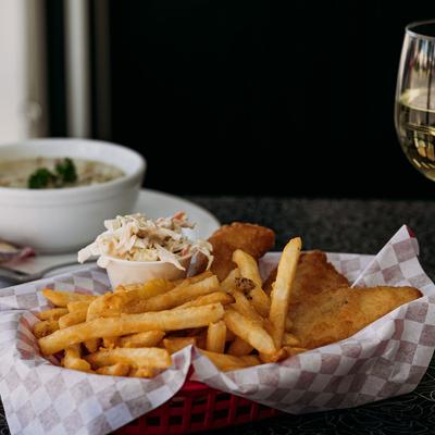 Fish and Chips plate, deep fried cod, fries, and coleslaw