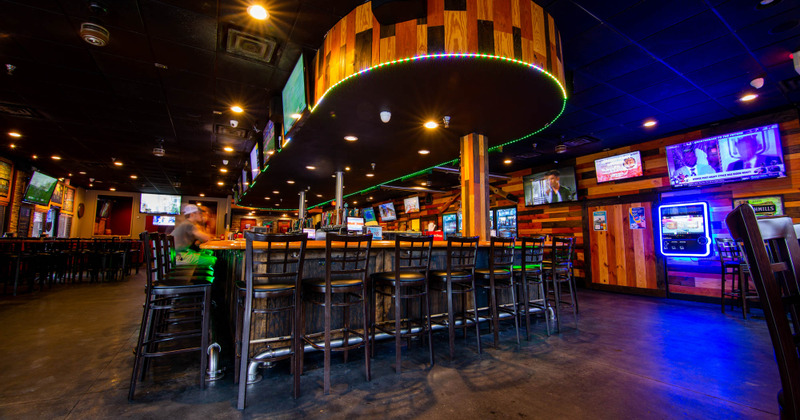Bar Area with wooden counter and high chairs