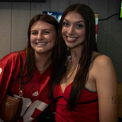 Two people posing for a photo and smiling.