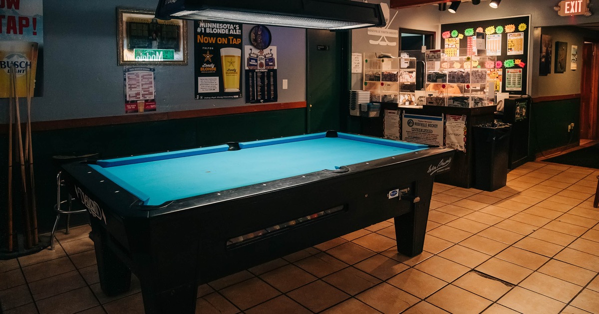 Interior, pool table with light above
