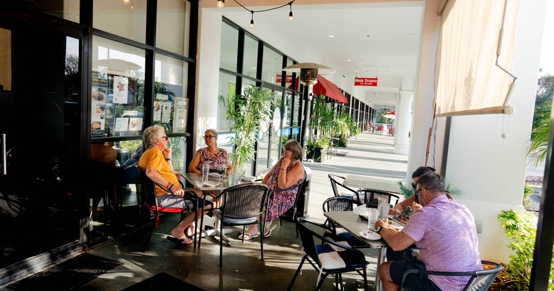 Exteriorm terrace, tables and chairs, guests