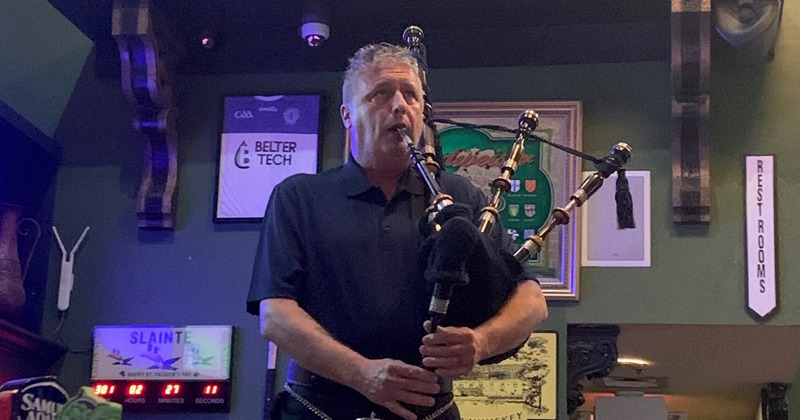 Musician playing bagpipes