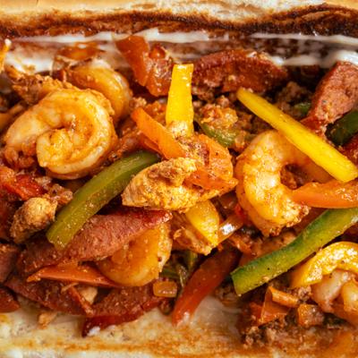 Sandwich with shrimps and veggies.
