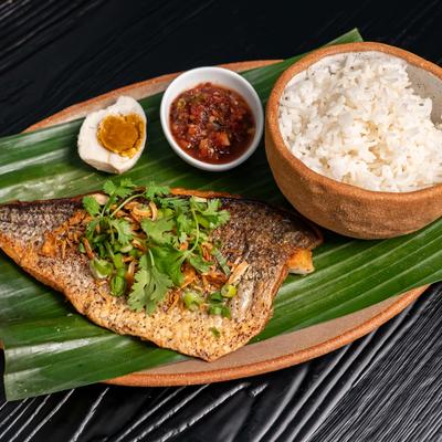 Served fish with sides.