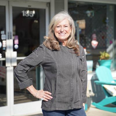 On of the owners standing in front of the restaurant.