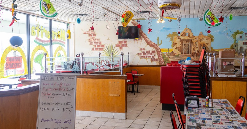 Interior, tables and chairs ready for guests