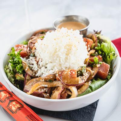 Ahi Tuna Poke Bowl, topped with rice.