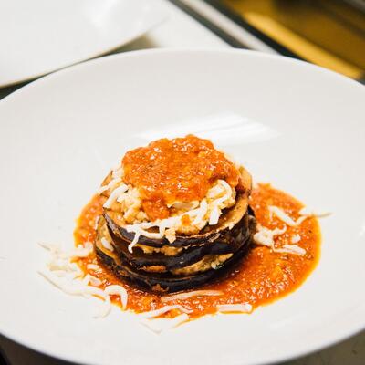 Melted cheese with pasta an decorations on the side