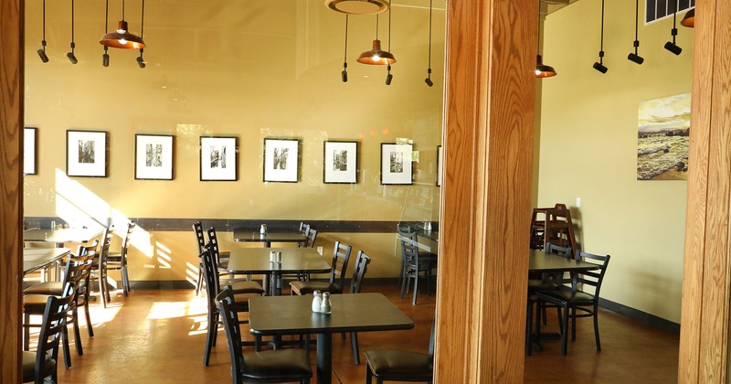 Restaurant interior, dining area, view from the outside thru the window