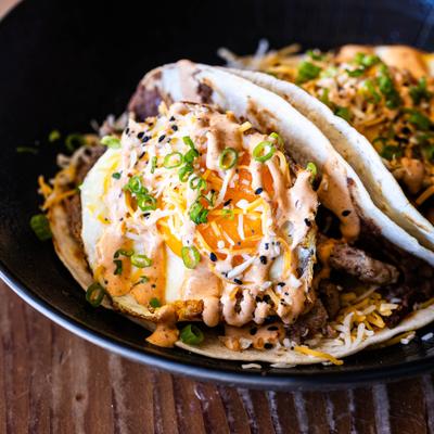 A serving of fried egg tacos.