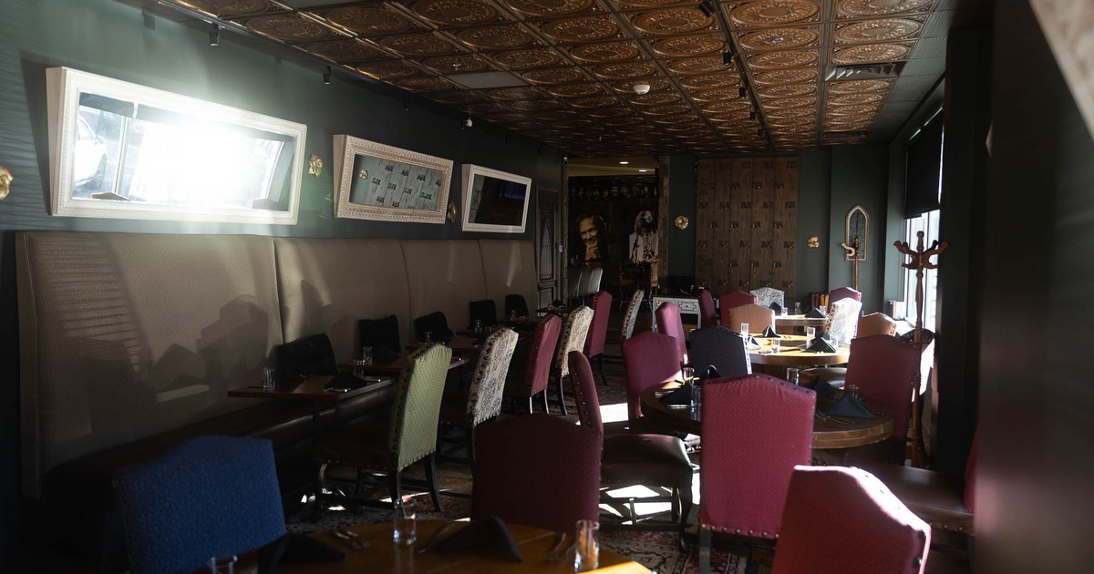 Interior, tables and chairs with tableware