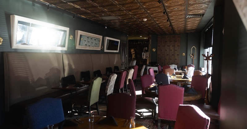 Interior, tables and chairs with tableware