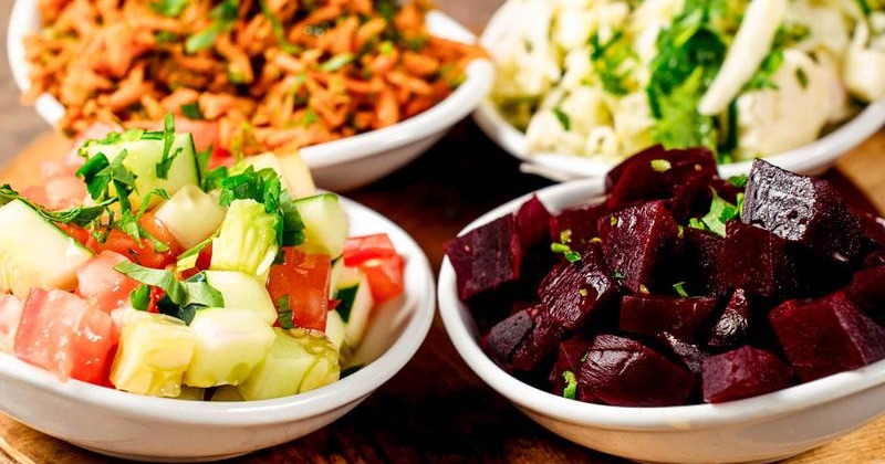Mediterranean dishes Roasted Beet & Parsley Salad, Tomato & Cucumber Salad, Spicy Carrot Salad, Cabbage & Citrus Salad