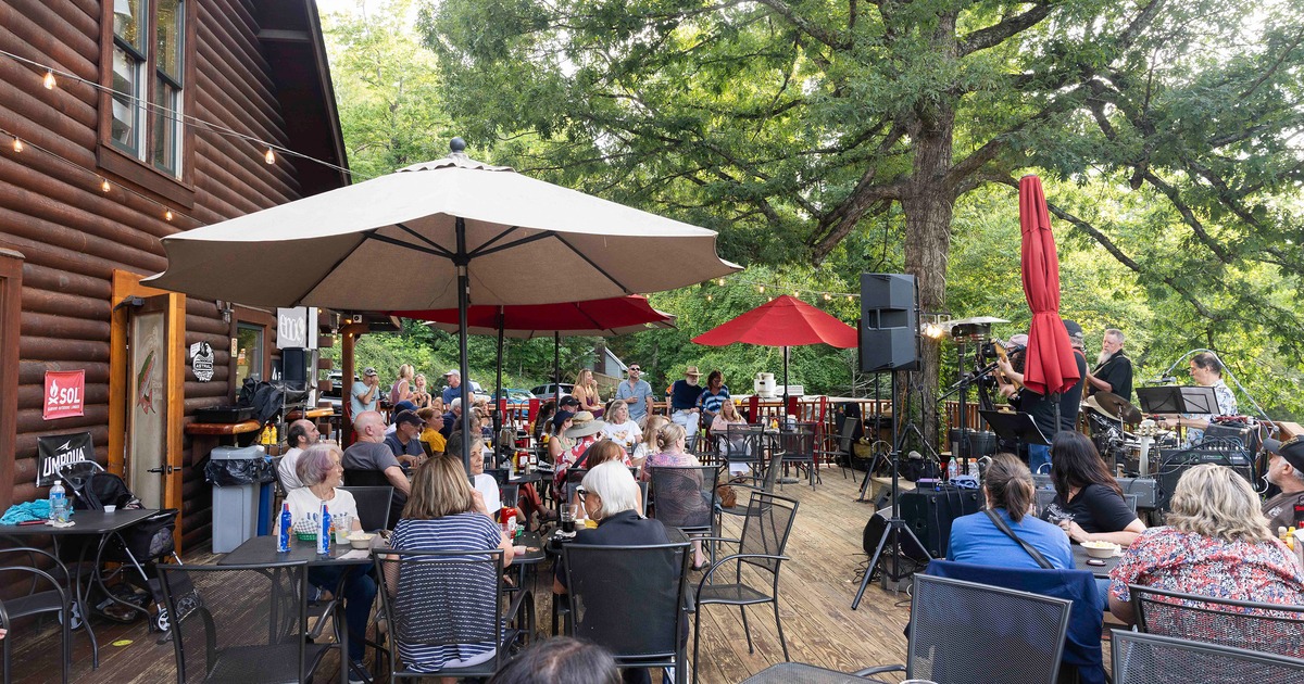 Outdoor seating area full of guests