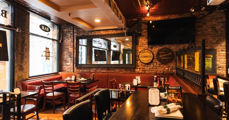 Interior, tables and chairs with entrance on the left