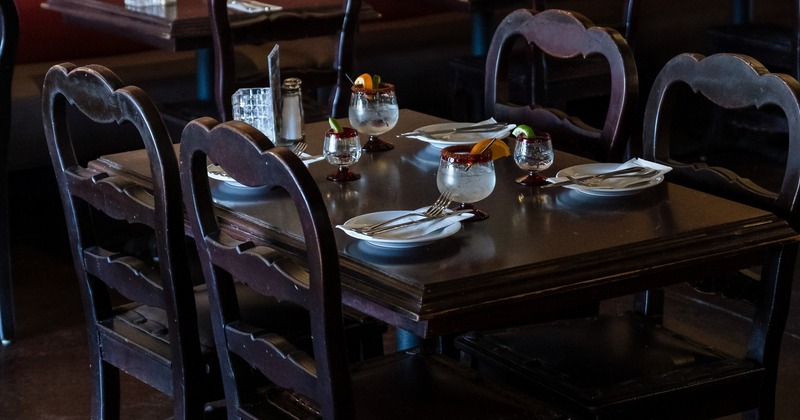 Interior, seating area with wooden tables and chairs
