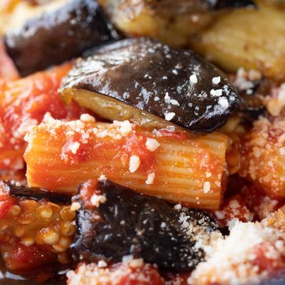 Close up view of Rigatoni alla Norma dish.
