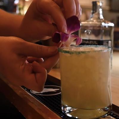 Garnishing a Margarita.