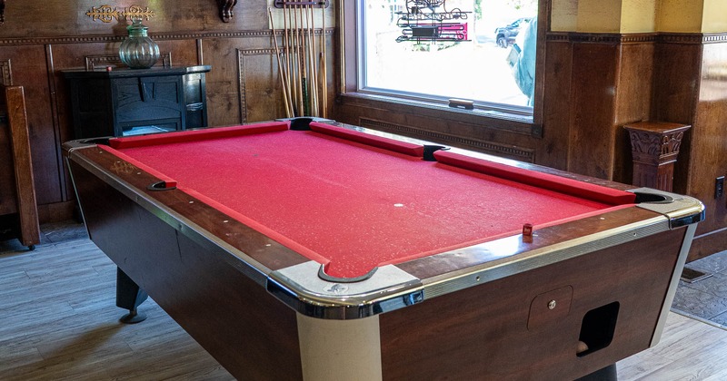 Interior, pool table near window