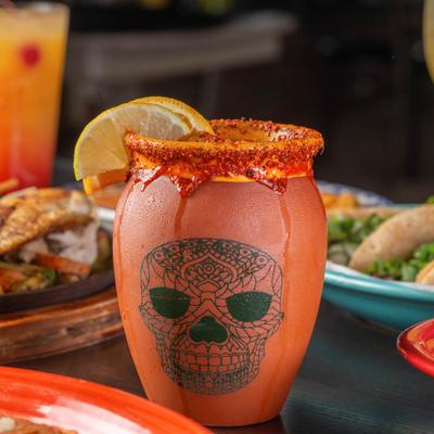 Cantarito cocktail served on the table.