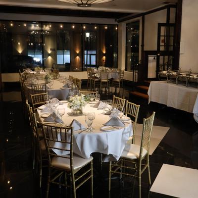 Dining area with elegantly set tables.
