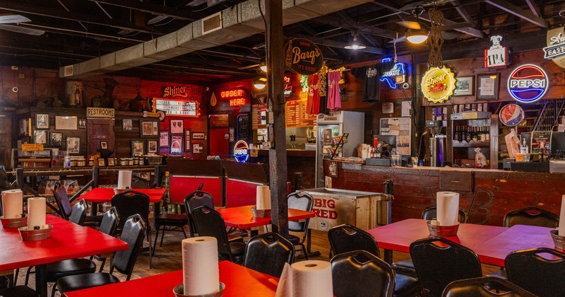 Interior, tables and chairs in dining area