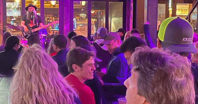 A crow of guests enjoying a gig