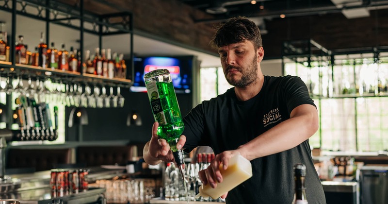 A bartender preparing a drink